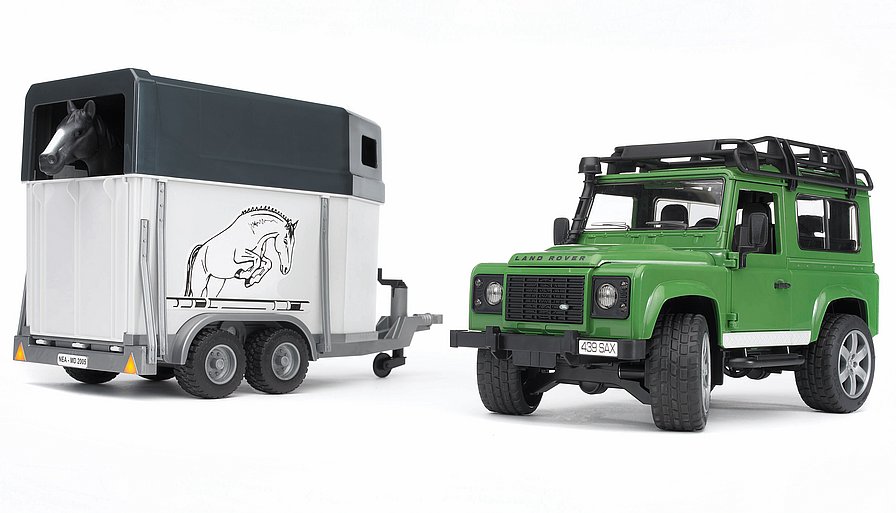 BRUDER 02592 LAND ROVER DEFENDER STATION WAGON CON RIMORCHIO